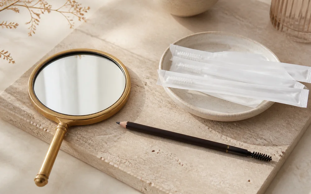 Brow mapping tools prepared for a permanent makeup consultation
