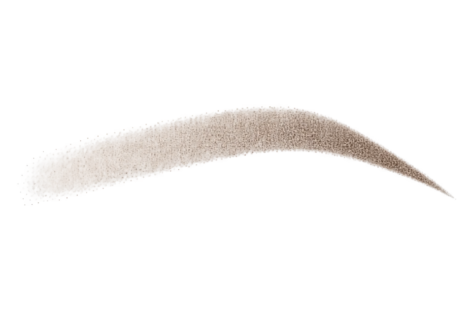 Illustration of ombré powder pigment: sparse light shading at the left front blending into a denser right tail.